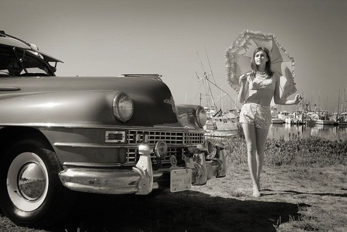 girl with old antique retro classic car