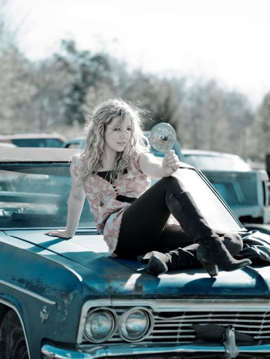 girl with old antique retro classic car