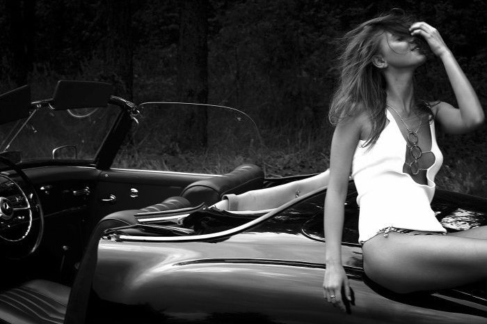 girl with old antique retro classic car