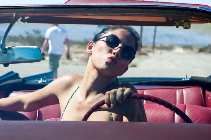 girl with old antique retro classic car