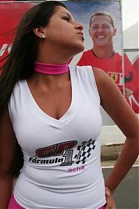 Motorsport models: Girl Kisses The Air Towards A Picture Of Michael Schumacher Sao Paulo 2006-10-20