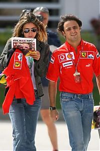 Motorsport models: Ferrari Fellipe Massa And Girlfriend Arrive At The Bahrain Circuit