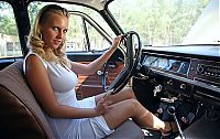 Motorsport models: girl with old antique retro classic car