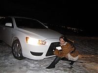 Motorsport models: girl with a car