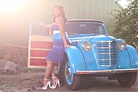 Motorsport models: girl with old antique retro classic car