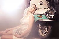 Motorsport models: girl with old antique retro classic car