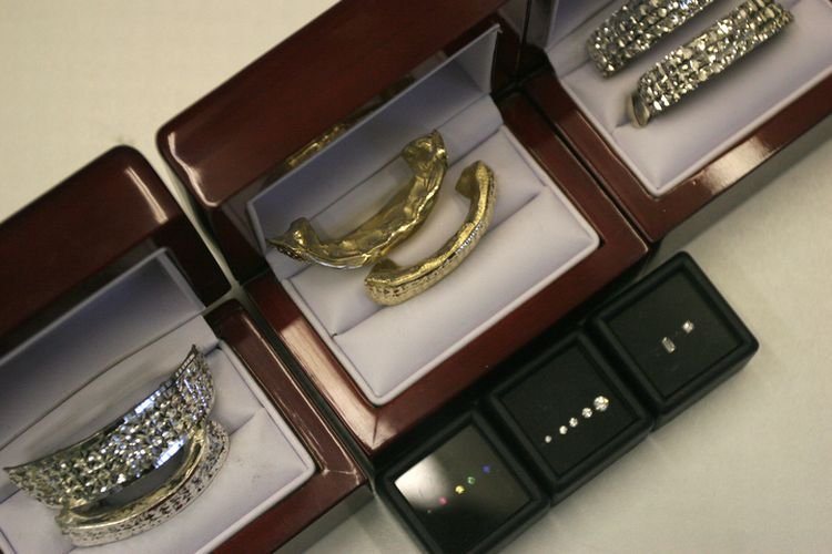 teeth holder jewelry around the world