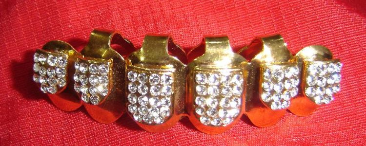 teeth holder jewelry around the world