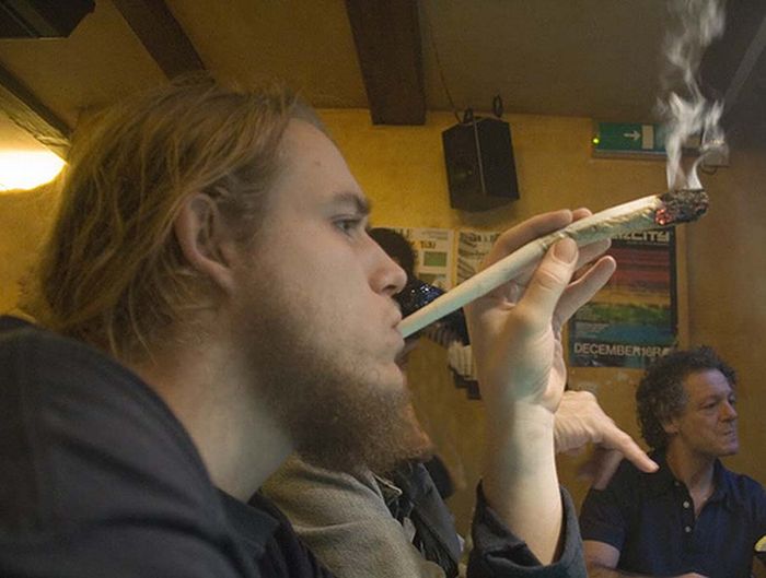 people with a big cigarette
