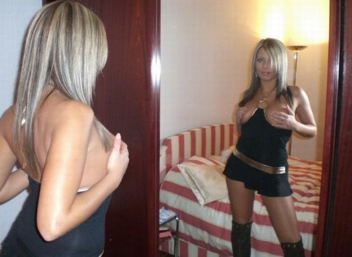 blonde girl amateur taking pictures at home