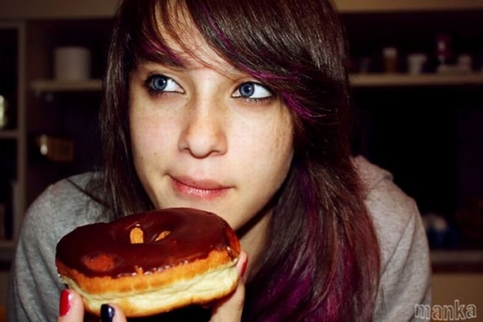 girl eating doughnut
