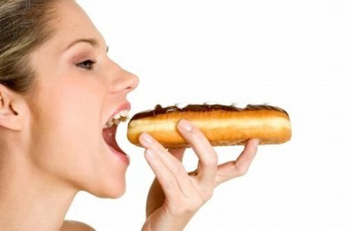 girl eating doughnut