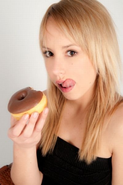 girl eating doughnut