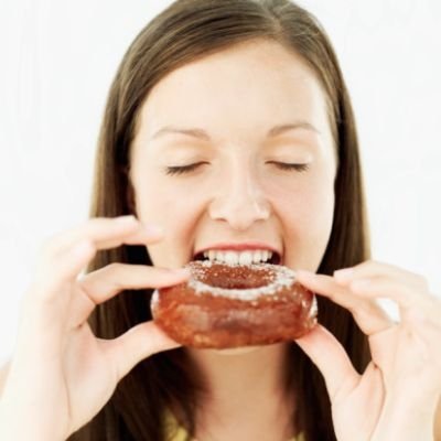 girl eating doughnut