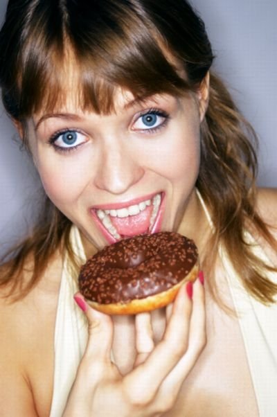 girl eating doughnut