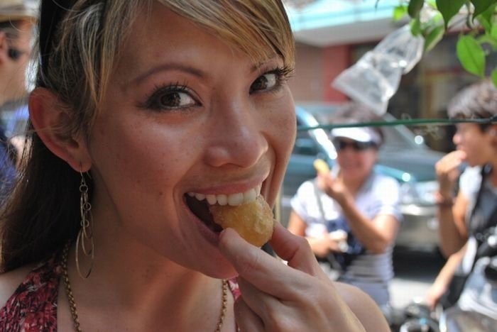 girl eating doughnut