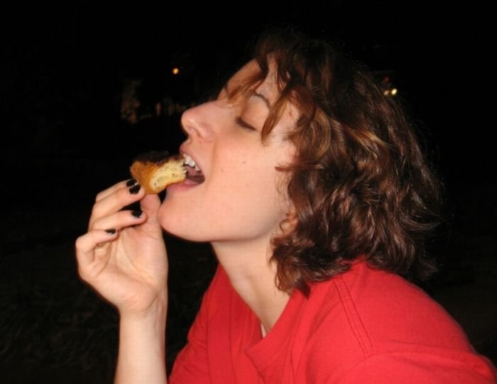 girl eating doughnut