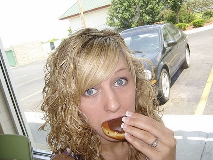 girl eating doughnut