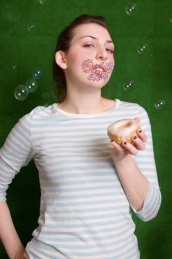 girl eating doughnut