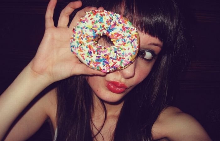 girl eating doughnut