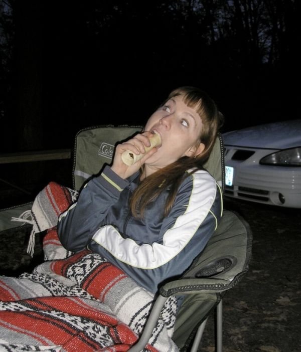 girl eating hot dog