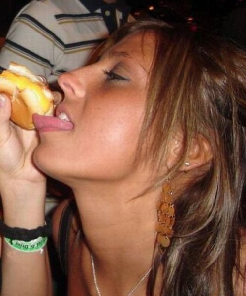 girl eating hot dog