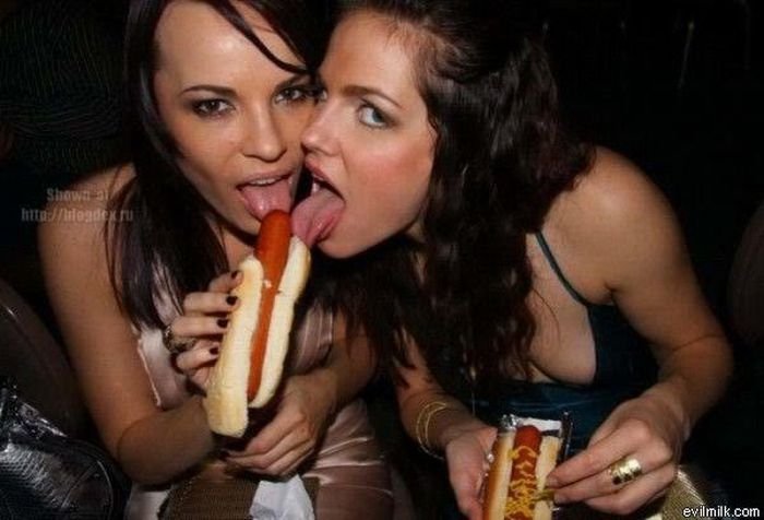 girl eating hot dog