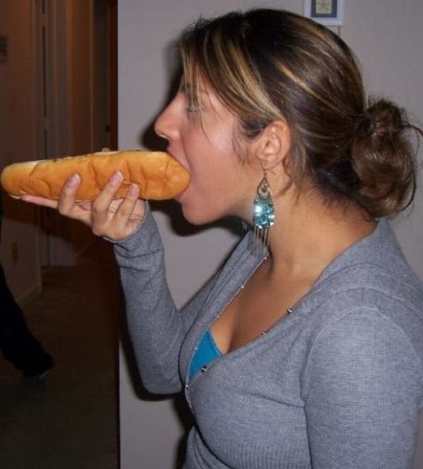 girl eating hot dog