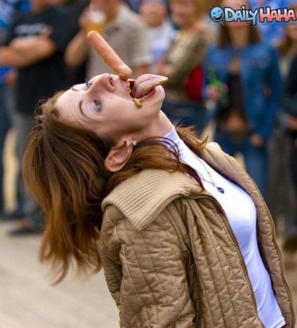 girl eating hot dog