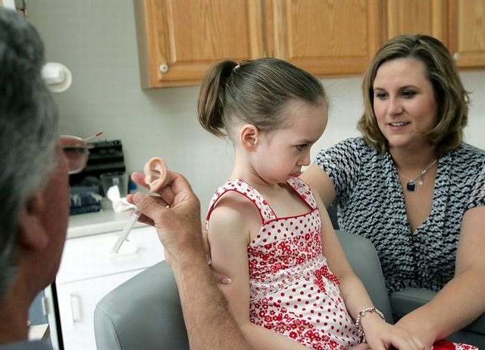 little girl gets new ear and cochlear implant