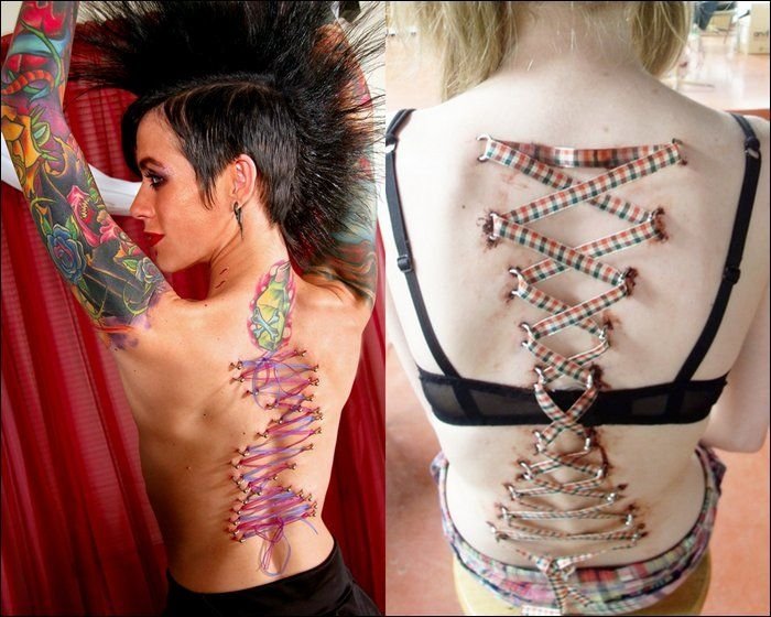 girl with a corset piercing and extreme body modifications