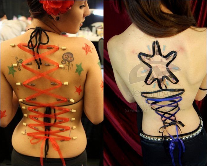 girl with a corset piercing and extreme body modifications