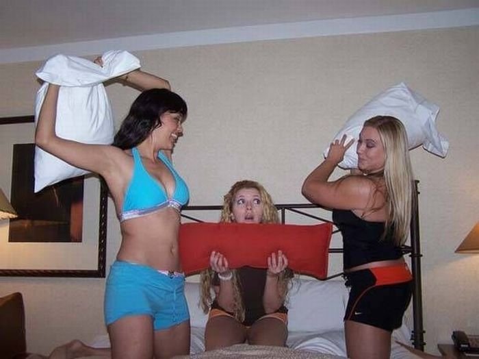 girls fighting with pillows