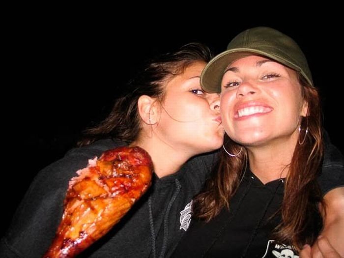 girls eating a turkey leg