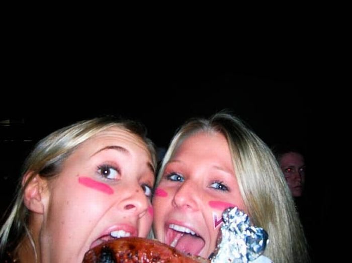 girls eating a turkey leg