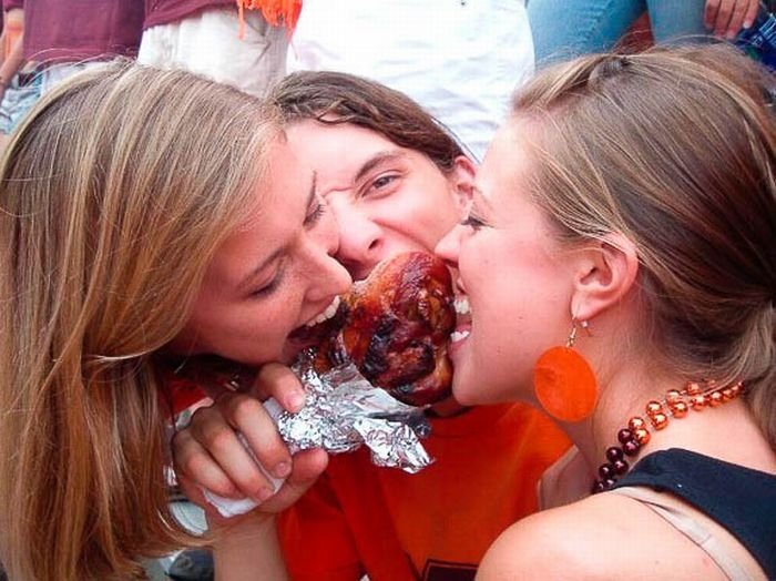 girls eating a turkey leg