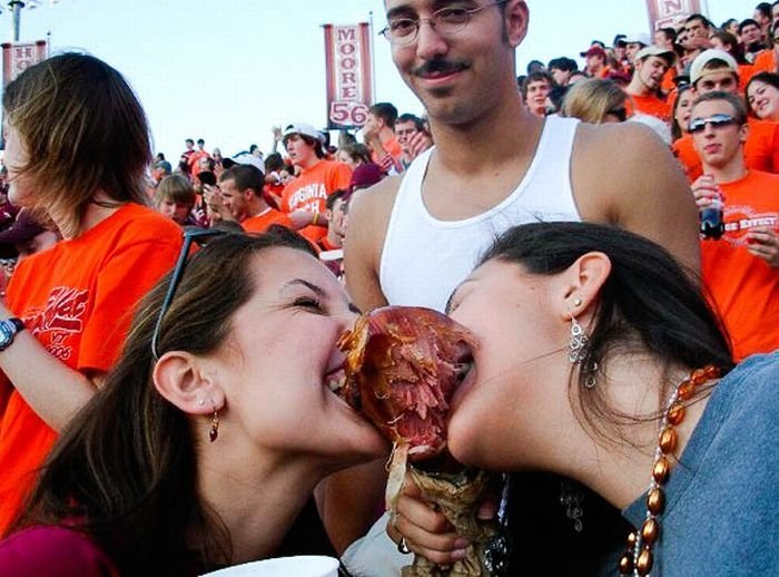 girls eating a turkey leg