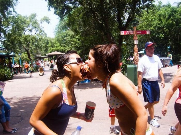 girls eating a turkey leg