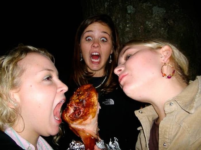 girls eating a turkey leg