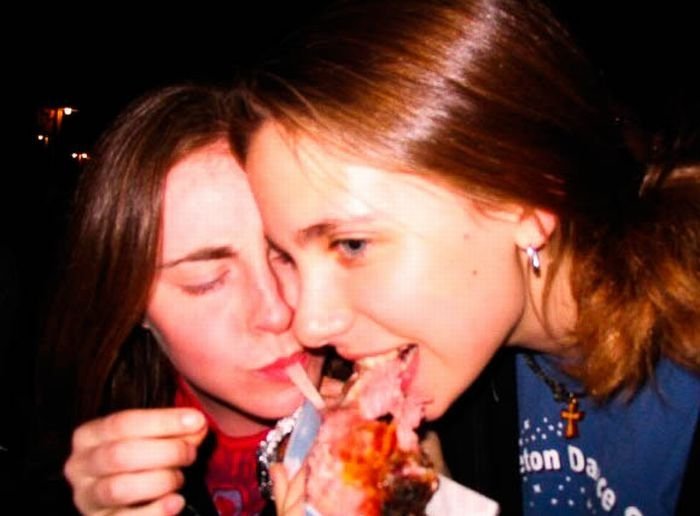 girls eating a turkey leg