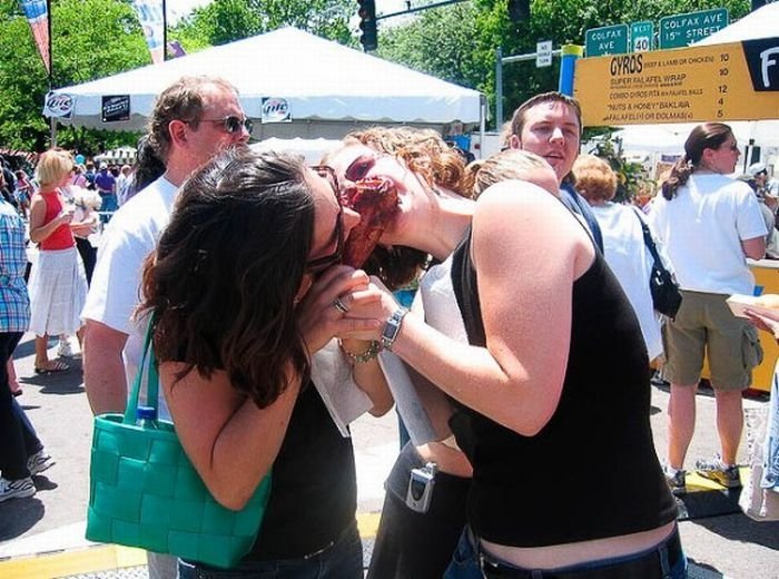 girls eating a turkey leg