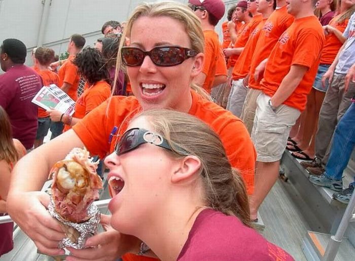 girls eating a turkey leg