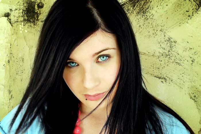 black haired girl with blue eyes