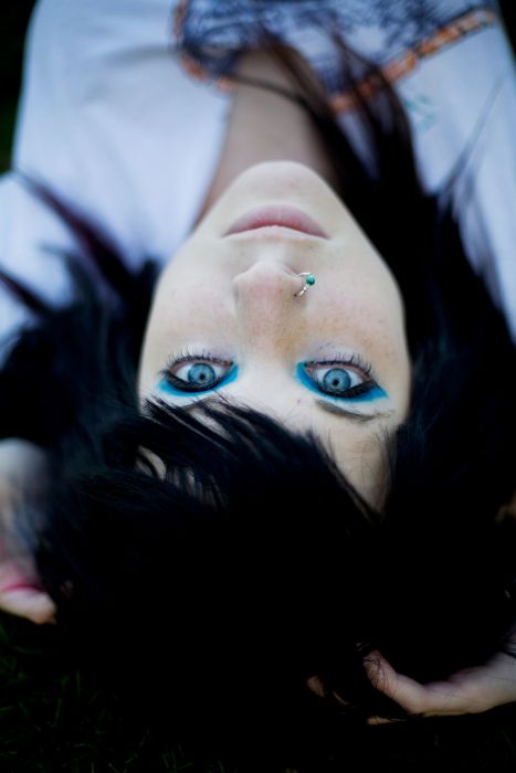 black haired girl with blue eyes