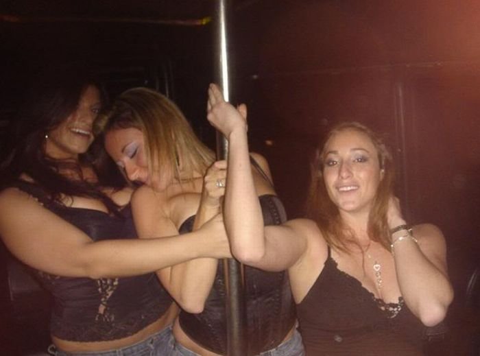 young teen college girls performing a pole dancing solo