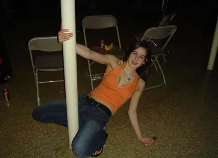 young teen college girls performing a pole dancing solo