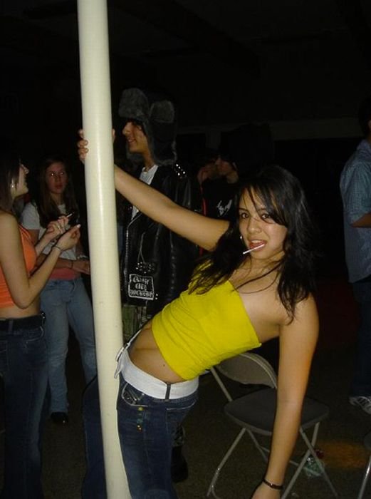 young teen college girls performing a pole dancing solo