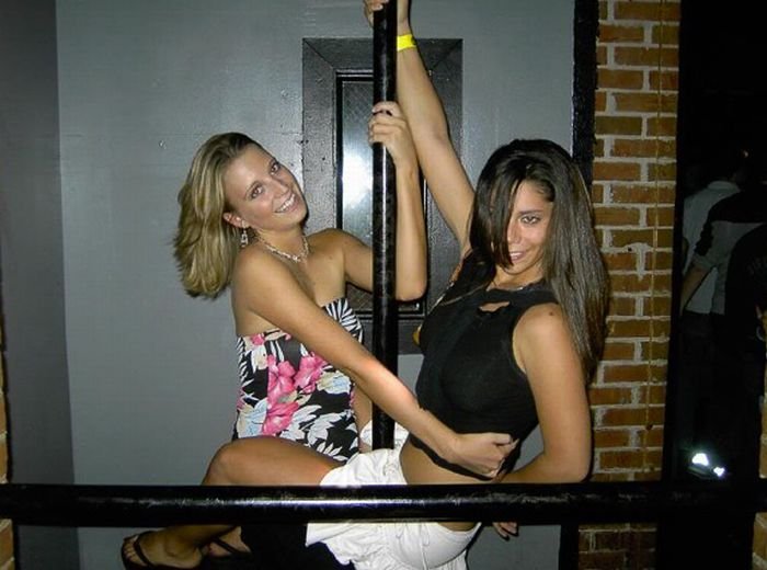 young teen college girls performing a pole dancing solo