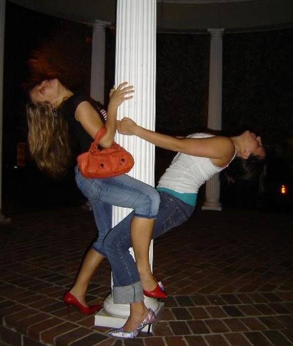 young teen college girls performing a pole dancing solo