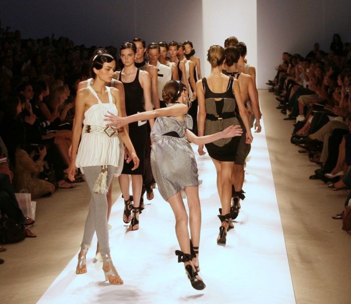 models falling on the catwalk